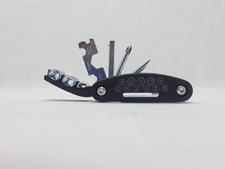 Black Stainless Steel Useful Multi Purpose Tools Kit for Mechanic Fix Functions in White Isolated Background 