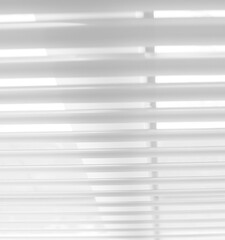 Abstract of white and gray background caused by light shining through the blinds, Dark and bright lines