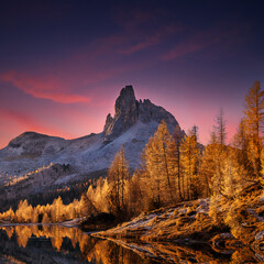  Scenic image of Fairy-tale Landscape with colorful overcast sky under sunlit, over the  Federa...