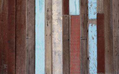 Old colourful wooden wall material background for vintage wallpaper.