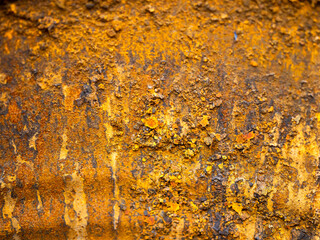 orange metal surface with rust