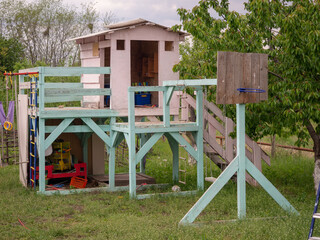 Fototapeta na wymiar wooden playground at the cottage