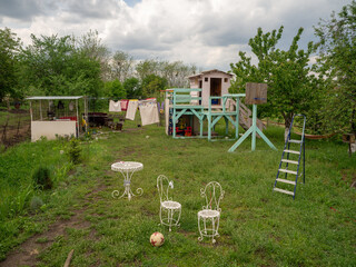 wooden playground at the cottage