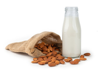Close Up glass of Almond milk with Almond seeds.  on white background