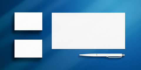 Minimalist Stationery Mockup Set of Business Cards, Envelope and Pen on blue background