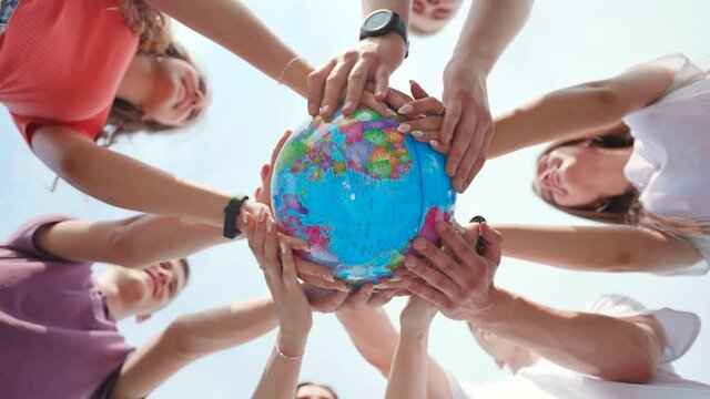 Children Holding the Earth: The Future is in Their Hands