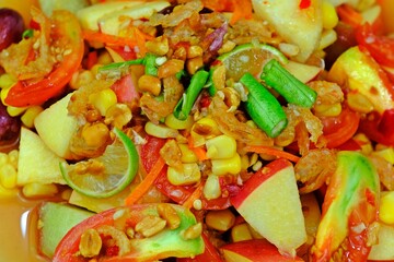 Close up hot and spicy mixed fruits salad. Thai food.