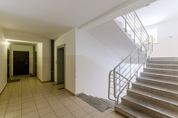 Russia, Moscow- February 10, 2020: interior public place, house entrance. doors, walls, staircase...