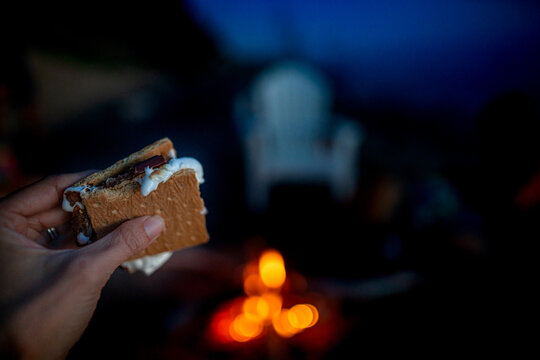 Hand Holding Smore By Fire