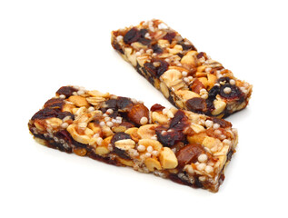 Honey bars with peanuts on white background