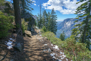 hiking the four mile trail in yosemite national park in california, usa