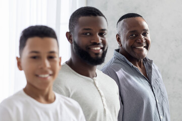 Multi Generational Male Family. Portrait Of Smiling Black Son, Father And Grandfather