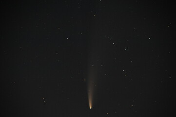 Obraz premium Stare selo, Ukraine, 16 July 2020. Neowise comet above the castle of Stare selo village in Ukraine.
