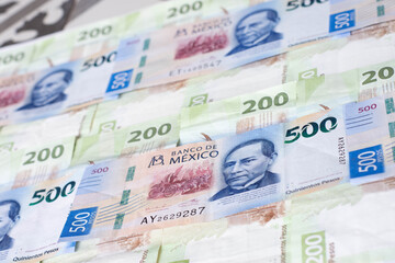 Five hunder money mexican bills close up with two hundred pesos