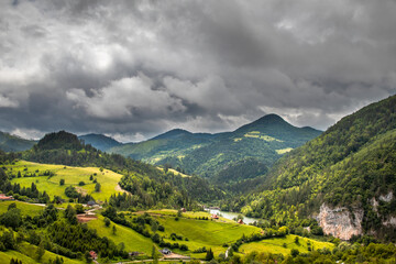 Fototapeta premium Beautiful small Spajici lake on Tara mountain in Serbia, Surrounded with mountain peaks