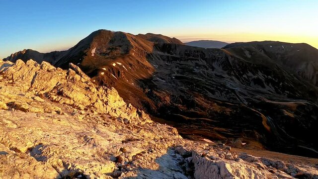 Amazing sunrise from the top of the mountain (Peak of Gra de Fajol, Ulldeter, Catalan Pyrenees, Spain)