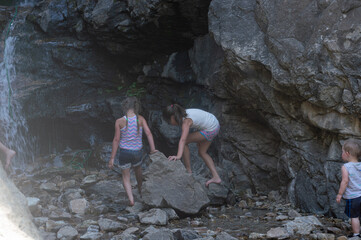 Kids playing in Rocky Mouth Waterfall — Utah