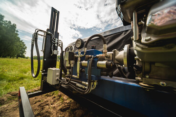 Soil examination. Collecting black soil on the field for examination