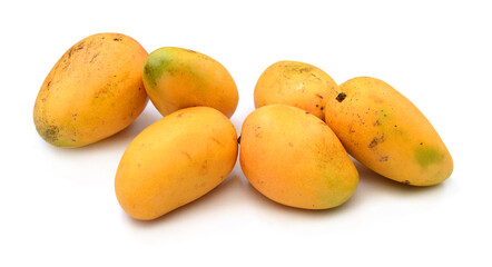 Ripe mango slices on white 