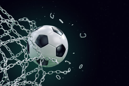Soccer ball breaking metal net. Concept of football goal, with ball breaking the metal chain net