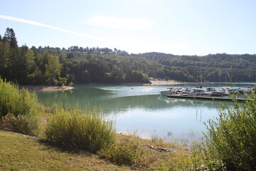 Fototapeta na wymiar Turquoise water lake in summer season