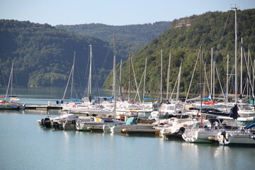 Fototapeta na wymiar Sail boats harbor on a turquoise lake