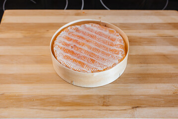 Delicious traditional German cheese close-up during cooking. To make a cheese