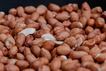 Close up of fried peanuts. Cooking process. 