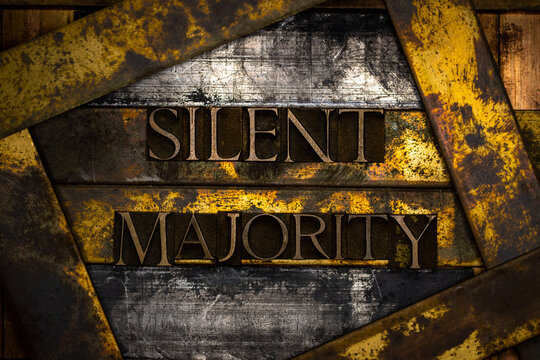 Silent Majority Text Formed With Real Authentic Typeset Letters On Vintage Textured Silver Grunge Copper And Gold Background