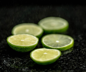 Fruits close up on black stone background