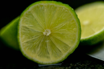 Fruits close up on black stone background