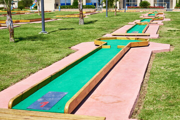 Miniature golf course in hotel. Entertainment for tourists at hotel