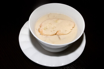 creamy mushroom soup in the white bowl
