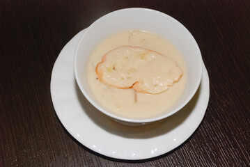 creamy mushroom soup in the white bowl