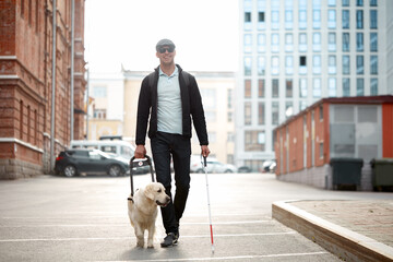 blind caucasian man guided by puppy. pet icon sign or symbol. guy with companion friend in city...