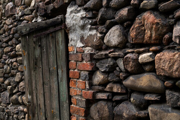 stone wall with wooden door