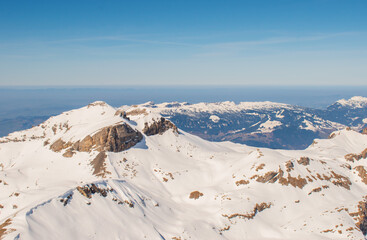 Beautiful panoramic view of snow-capped mountains in the Swiss Alps.