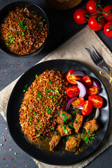 Buckwheat groats baked in the oven with beef goulash