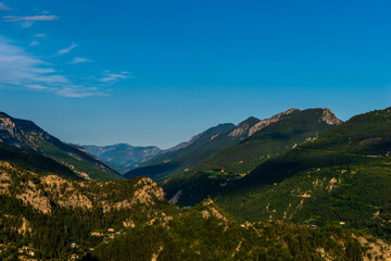 A picturesque landscape view of the Alps mountains in the evening during sunset (Puget-Theniers, Alpes-Maritimes, France)