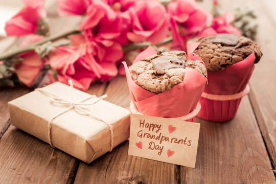 Lovely card with red flowers, gift box, craft tag and couple cupcakes.