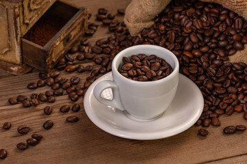 Cup of coffee and coffee beans.