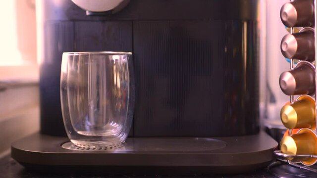 Delicious coffee being made in kitchen