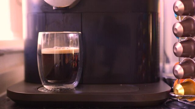 Delicious coffee being made in kitchen