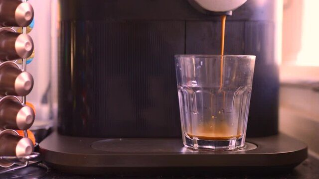 Delicious coffee being made in kitchen