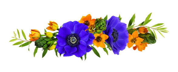 Orange ornithogalum flowers and blue anemones in a floral arrangement