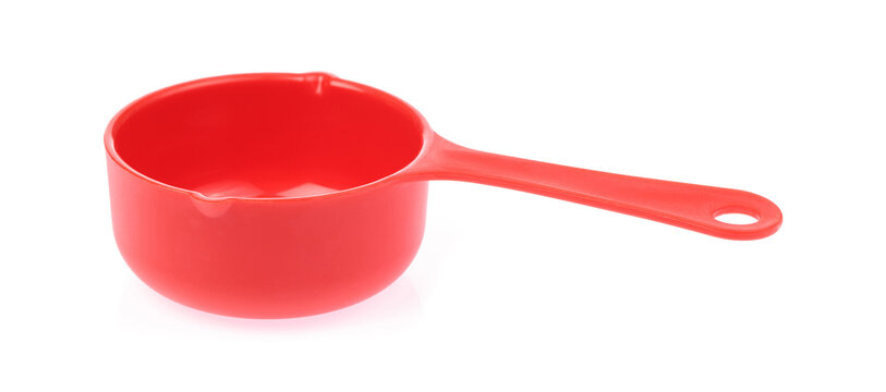 Red plastic scoop isolated on white background