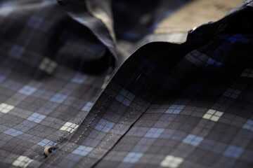 Close up of Men's checkered shirt.	