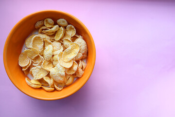 Breakfast with cereals on a pink background