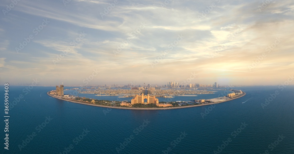 Wall mural Amazing panoramic view of the Palm Islands in Dubai with marina skyline in background; ultimate tourist destination; 