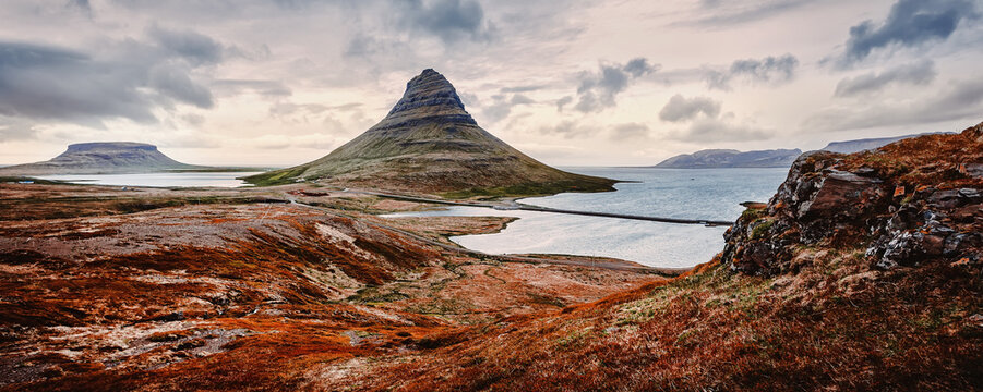 Incredible Nature landscape of Iceland. A magnificent panorama of the mountains of Icelandic coastline. Kirkjufell mountain, Iceland. the most Famous locations for travel . Best plases on the world © jenyateua